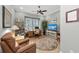 Home office with built-in shelving and comfortable seating at 330 Compass Point Dr # 101, Bradenton, FL 34209