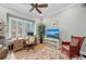Home office with desk, TV, and comfortable seating at 330 Compass Point Dr # 101, Bradenton, FL 34209
