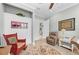 Bright home office features built-in shelving and comfortable seating at 330 Compass Point Dr # 101, Bradenton, FL 34209