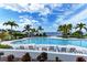 Resort-style pool with comfortable seating and waterfront views at 330 Compass Point Dr # 101, Bradenton, FL 34209