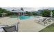 Relaxing pool area with lounge chairs at 330 Compass Point Dr # 101, Bradenton, FL 34209