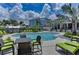 Resort-style pool with seating and lounge chairs at 330 Compass Point Dr # 101, Bradenton, FL 34209