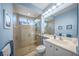 Clean bathroom with walk-in shower and single vanity at 4790 Sweetshade Dr, Sarasota, FL 34241