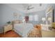 Comfortable bedroom with a full bed and rocking chair at 4790 Sweetshade Dr, Sarasota, FL 34241