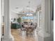 Bright breakfast nook with water views and access to patio at 4790 Sweetshade Dr, Sarasota, FL 34241