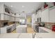 Modern kitchen featuring stainless steel appliances and a large island at 4790 Sweetshade Dr, Sarasota, FL 34241