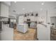 Bright kitchen with island, stainless steel appliances, and tile flooring at 4790 Sweetshade Dr, Sarasota, FL 34241