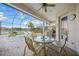 Relaxing screened-in pool area with patio furniture at 4790 Sweetshade Dr, Sarasota, FL 34241