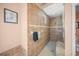 Walk-in shower with tile surround and built-in seat at 4790 Sweetshade Dr, Sarasota, FL 34241