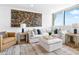 Comfortable living room features brick accent wall, contemporary decor, and ample seating at 4822 Ocean Blvd # 8C, Sarasota, FL 34242