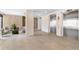 Modern lobby area with elevators, tiled walls, and comfortable seating arrangement at 4822 Ocean Blvd # 8C, Sarasota, FL 34242
