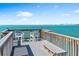 Relax on the pier with comfortable seating and breathtaking waterfront views, the perfect place to unwind at 4822 Ocean Blvd # 8C, Sarasota, FL 34242
