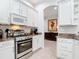 Well-equipped kitchen with stainless steel appliances and granite countertops at 5062 Flagstone Dr, Sarasota, FL 34238