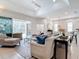 Spacious living room with sliding glass doors to lanai at 5062 Flagstone Dr, Sarasota, FL 34238