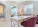 Home office with built-in desk and access to the backyard pool at 5062 Flagstone Dr, Sarasota, FL 34238