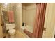 Bathroom features a tub shower and updated fixtures at 514 Spring Lakes Blvd, Bradenton, FL 34210
