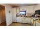 Bright eat-in kitchen features ample cabinetry and modern appliances at 514 Spring Lakes Blvd, Bradenton, FL 34210