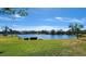 Scenic lake view with blue skies at 514 Spring Lakes Blvd, Bradenton, FL 34210