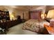 Large main bedroom with a king-size bed and ample closet space at 514 Spring Lakes Blvd, Bradenton, FL 34210