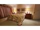 Main bedroom with a king bed and lots of natural light at 514 Spring Lakes Blvd, Bradenton, FL 34210