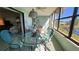Sunroom with glass doors and water views at 514 Spring Lakes Blvd, Bradenton, FL 34210
