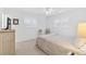 Bedroom with double bed, wicker furniture, ceiling fan at 521 W Venice Ave # 22, Venice, FL 34285