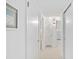 Hallway with carpet, doors to bedrooms and other rooms at 521 W Venice Ave # 22, Venice, FL 34285