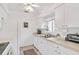 White kitchen with appliances, ample counter space at 521 W Venice Ave # 22, Venice, FL 34285