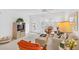 Bright living room with comfy seating, large windows, and neutral color palette at 521 W Venice Ave # 22, Venice, FL 34285