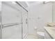 Bathroom with shower stall and marble vanity at 5803 Garden Lakes Palm, Bradenton, FL 34203