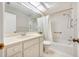 Bathroom with tub, toilet, and vanity at 5803 Garden Lakes Palm, Bradenton, FL 34203