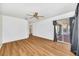 Spacious bedroom with wood-look floors and sliding glass doors at 5803 Garden Lakes Palm, Bradenton, FL 34203