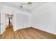 Bedroom with wood-look floors and spacious closet at 5803 Garden Lakes Palm, Bradenton, FL 34203