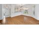 Bright dining area with wood floors and kitchen views at 5803 Garden Lakes Palm, Bradenton, FL 34203