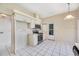 Kitchen with stainless steel appliances and white cabinets at 5803 Garden Lakes Palm, Bradenton, FL 34203