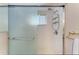 Shower stall with glass door and tiled walls at 5938 Welcome Rd # H22, Bradenton, FL 34207