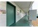 Building hallway with mailboxes and fire escape at 5938 Welcome Rd # H22, Bradenton, FL 34207