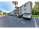 Parking lot with designated parking spaces at 5938 Welcome Rd # H22, Bradenton, FL 34207