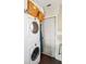 Convenient laundry closet with stackable washer and dryer at 5940 Briarwood Ave, Sarasota, FL 34231