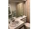 Clean bathroom with a sink, toilet, and shower at 6304 Pointe West Blvd # A203, Bradenton, FL 34209