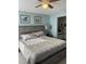 Main bedroom with a bed and ensuite bathroom at 6304 Pointe West Blvd # A203, Bradenton, FL 34209
