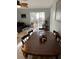Dining room with a large wooden table and chairs at 6304 Pointe West Blvd # A203, Bradenton, FL 34209