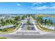 Aqua community entrance with palm trees and signage at 6404 Pigeon Plum Way, Bradenton, FL 34210
