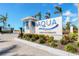 Aqua community entrance sign with landscaping at 6404 Pigeon Plum Way, Bradenton, FL 34210