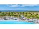 Relaxing lagoon with beach access and lounge chairs at 6404 Pigeon Plum Way, Bradenton, FL 34210