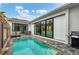 Private pool with patio and grill at 6404 Pigeon Plum Way, Bradenton, FL 34210