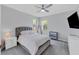 Spacious bedroom with a plush bed and plenty of natural light at 6650 Cheswick St, Sarasota, FL 34243