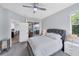 Main bedroom with access to the backyard through sliding doors at 6650 Cheswick St, Sarasota, FL 34243