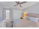 Cozy bedroom with a double bed, and ample closet space at 6650 Cheswick St, Sarasota, FL 34243