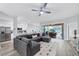 Open living space with sectional sofa and kitchen island view at 6650 Cheswick St, Sarasota, FL 34243